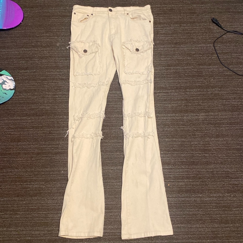Cream stacked jeans
